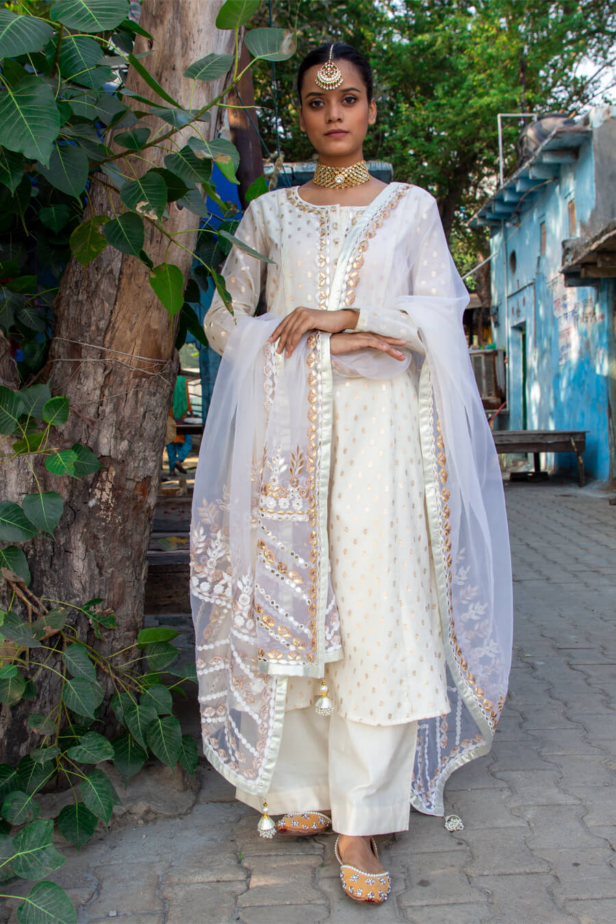 Off- white banarsi booti embroidered suit